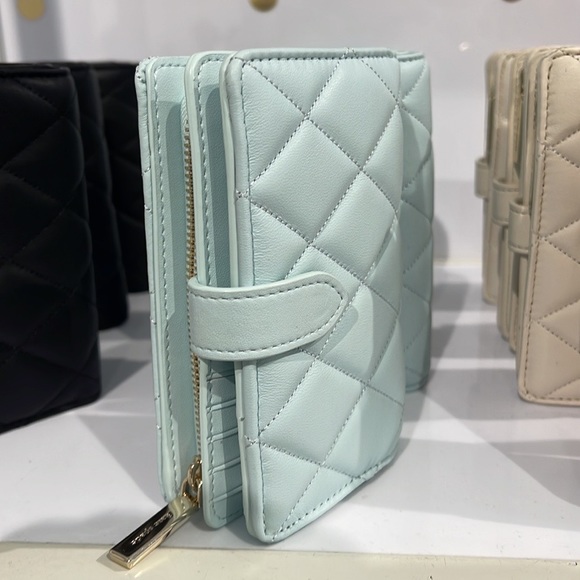 Kate Spade Carey Medium Compartment Bifold Wallet
COLOR: Turquoise - Picture 10 of 16